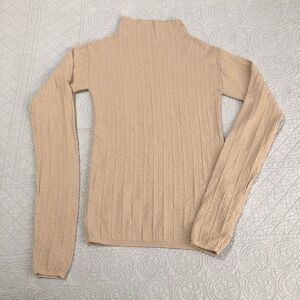 Aeron high neck long sleeve top. Size medium.